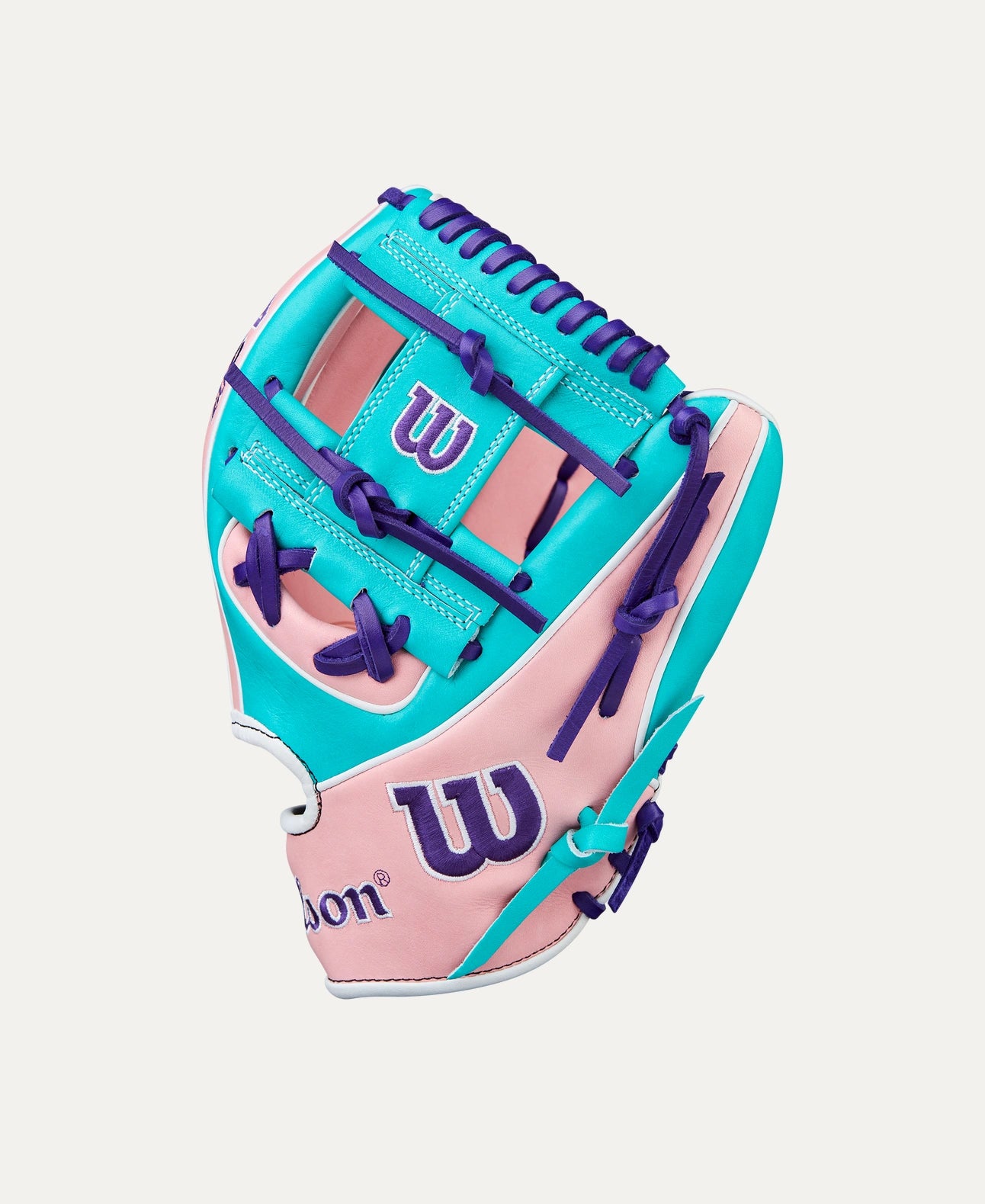 An 11.5” infield glove with Pink & Teal Pro Stock® Select leather for work at second base, third base or shortstop.